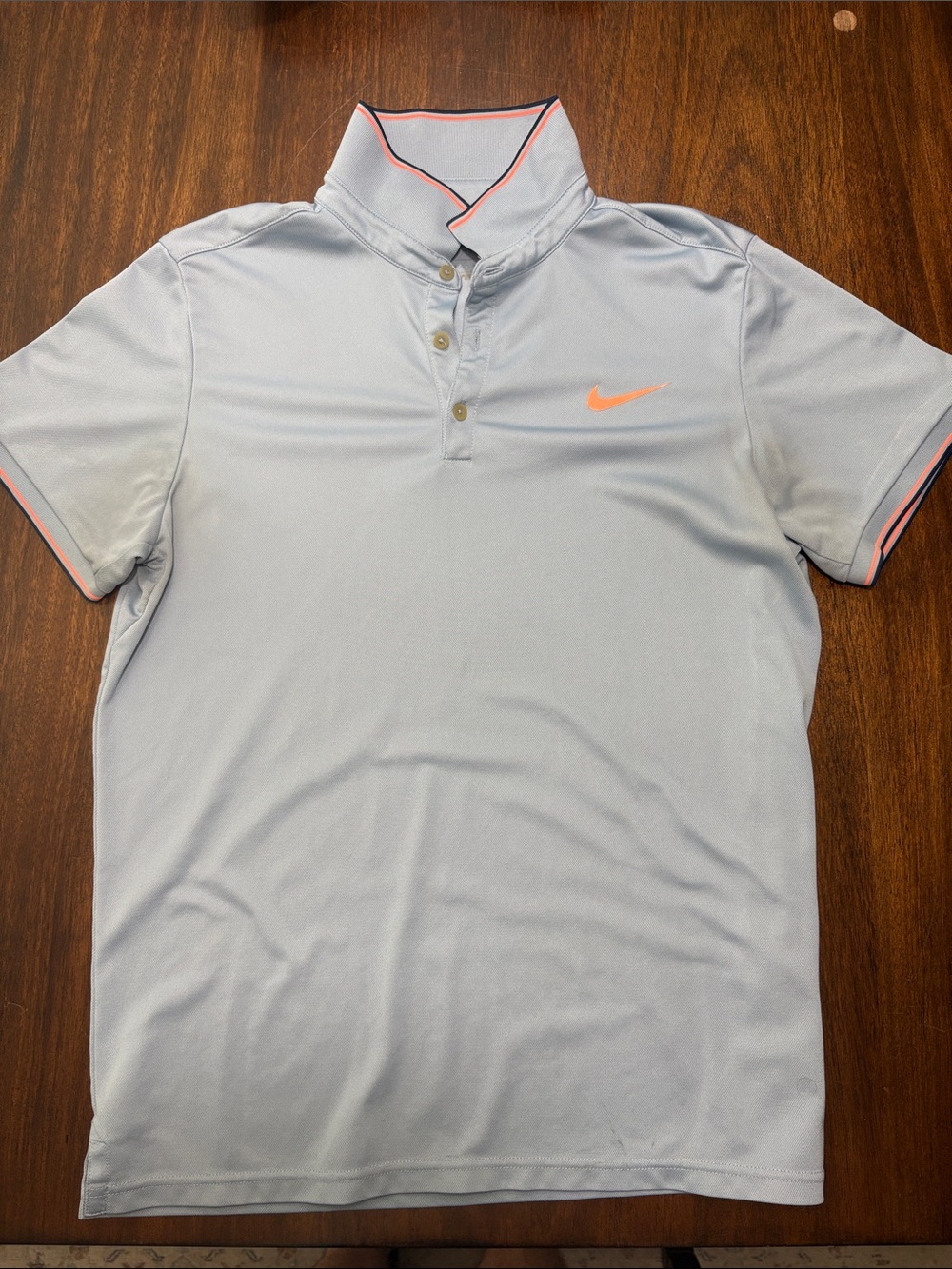 Nike Men’s Light Blue Polo with Orange Swoosh